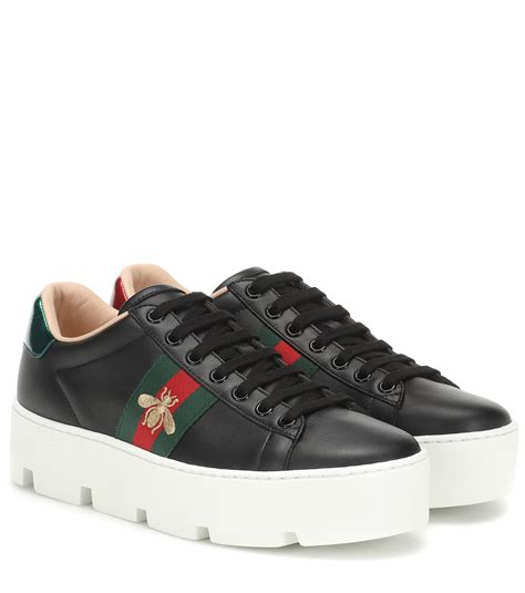 black ace gucci sneakers|Gucci ace embellished leather sneakers.